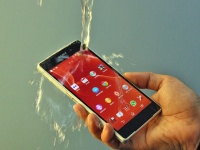 The Sony Xperia Z2 held under a tap